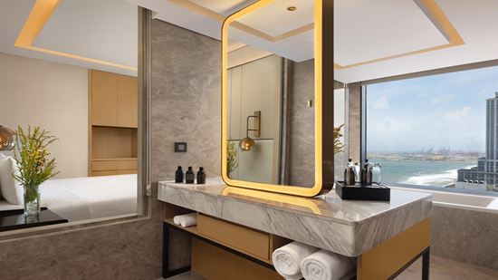 A bathroom of an Executive Suite Ocean View room at Amari Colombo